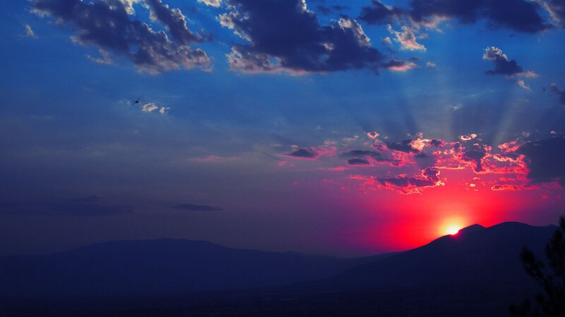 Sunset over Mountains — Red, Dramatic, Photograph, Airplane, Clouds