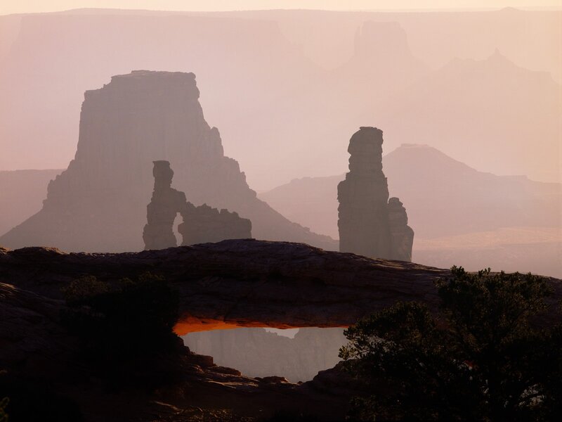 Sunset over natural rock arch