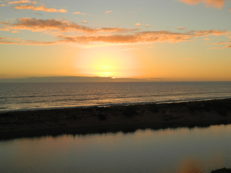 Sunset over Ocean and River