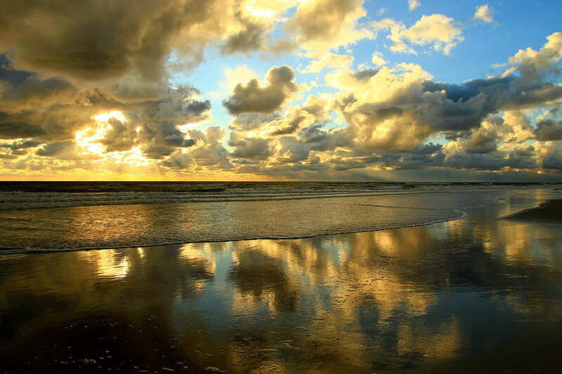 Sunset over Ocean Beach — Blue, Dramatic, Photograph, Clouds, Sand, Yellow, Gray