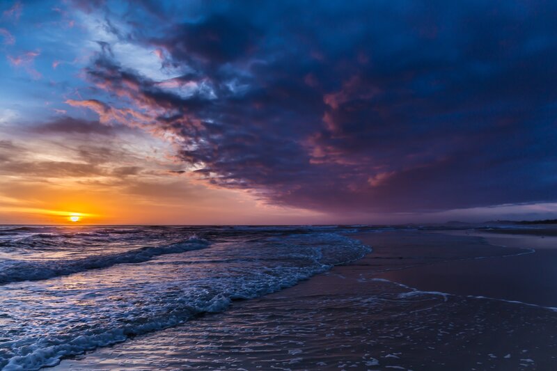 Sunset over Ocean Beach — Blue, Dramatic, Photograph, Sun