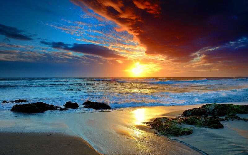 Sunset over Ocean Beach — Blue, Dramatic, Photograph, Waves, Rocks, Clouds