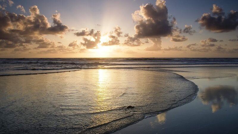 Sunset over Ocean Beach — Blue, Serene, Photograph, Clouds, Sand, Gold
