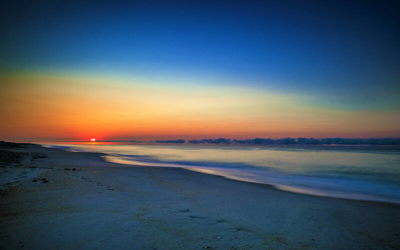 Sunset over Ocean Beach — Blue, Serene, Photograph, Sun