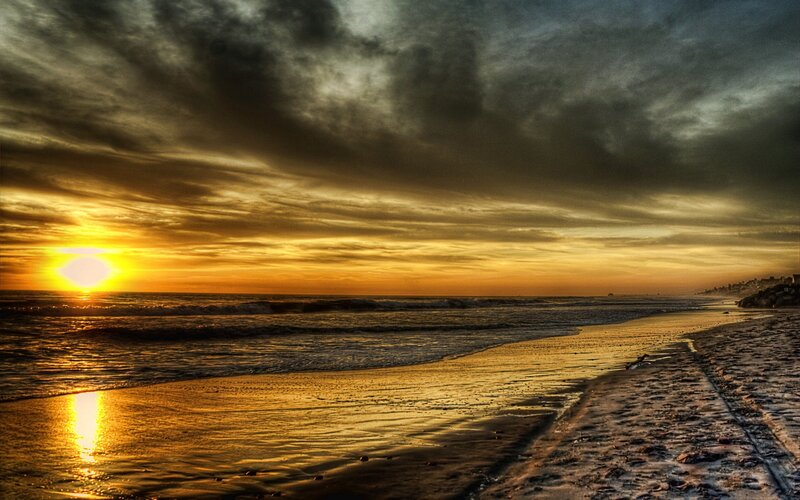 Sunset over Ocean Beach — Gold, Dramatic, Photograph, Sky