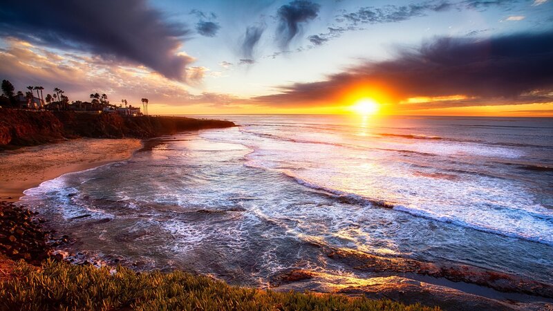 Sunset over Ocean Beach — Orange, Dramatic, Photograph, Cliff