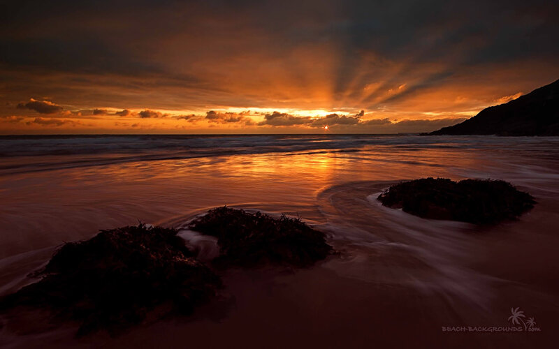 Sunset over Ocean Beach — Orange, Dramatic, Photograph, Clouds, Rocks