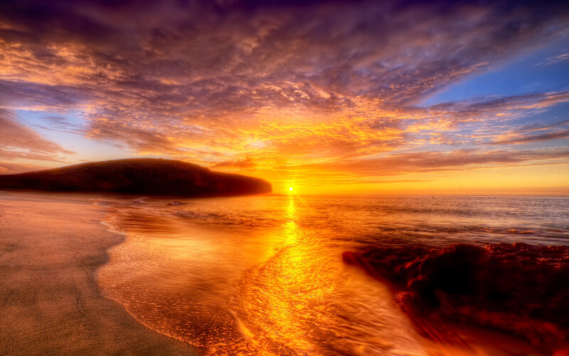 Sunset over Ocean Beach — Orange, Dramatic, Photograph, Clouds, Sand, Rock