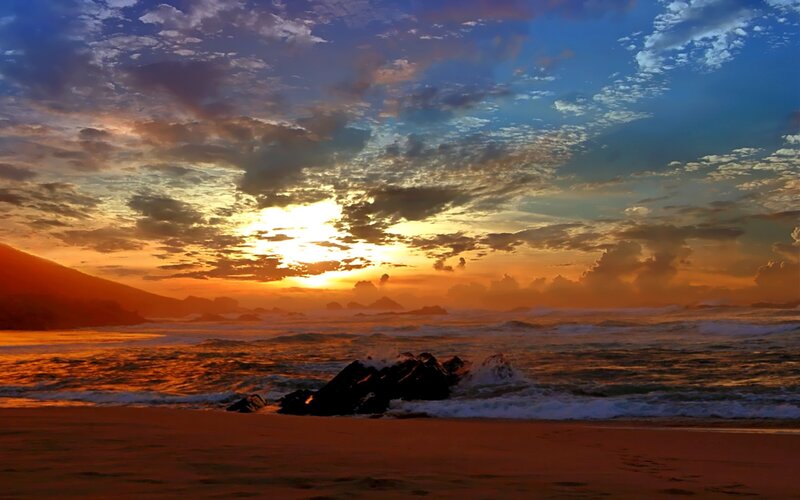 Sunset over Ocean Beach — Orange, Dramatic, Photograph, Mountain, Rocks, Waves