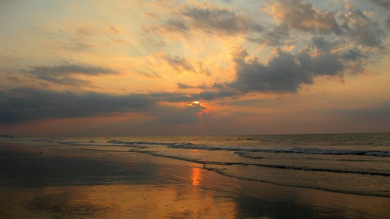 Sunset over Ocean Beach — Orange, Serene, Photograph, Clouds, Sand