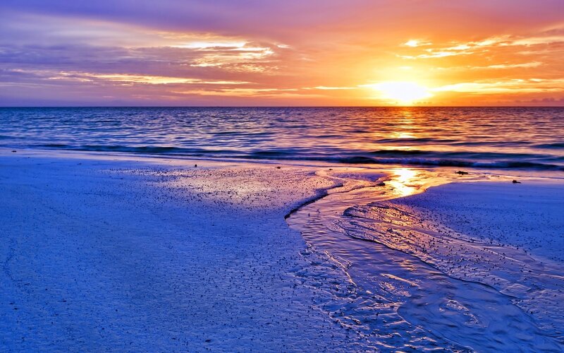 Sunset over Ocean Beach — Orange, Serene, Photograph, Sky, Sand