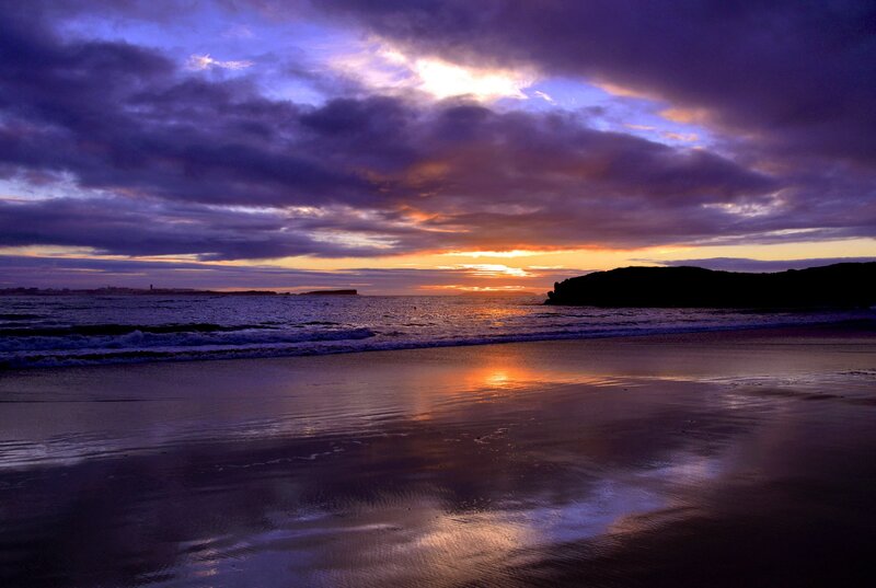Sunset over Ocean Beach — Purple, Dramatic, Photograph, Clouds, Sand, Cliff