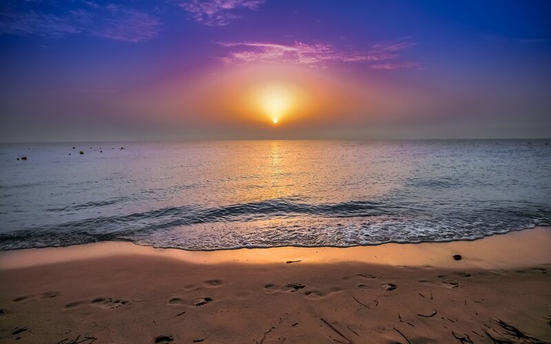 Sunset over Ocean Beach — Purple, Serene, Photograph, Sand