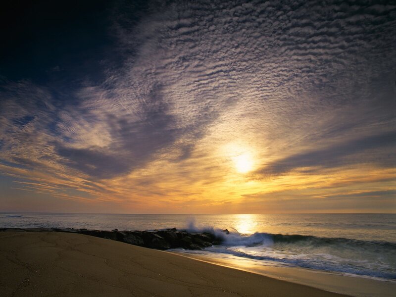 Sunset over Ocean Beach — Yellow, Dramatic, Photograph, Clouds