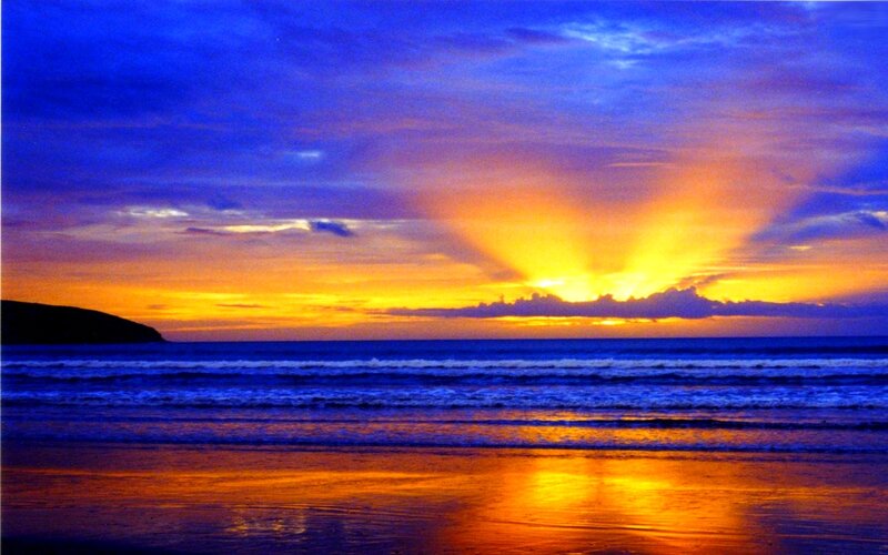 Sunset over Ocean — Blue, Dramatic, Photograph, Beach, Clouds