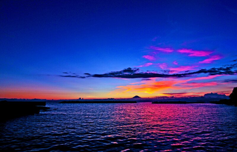 Sunset over Ocean — Blue, Dramatic, Photograph, Clouds, Mountain, Water