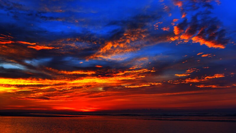 Sunset over Ocean — Blue, Dramatic, Photograph, Clouds, Sky