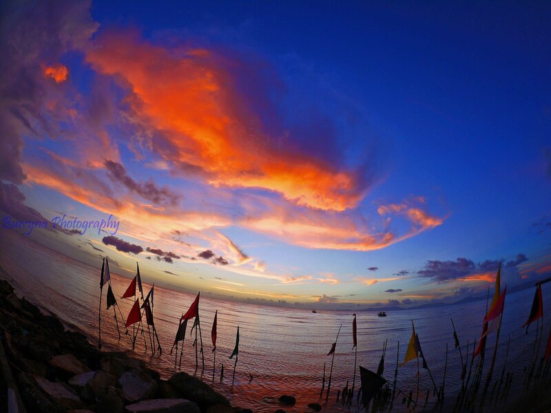 Sunset over Ocean — Blue, Dramatic, Photograph, Flags