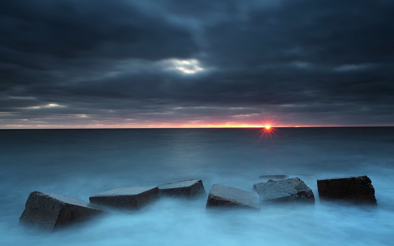 Sunset over Ocean — Blue, Dramatic, Photograph, Rocks, Clouds