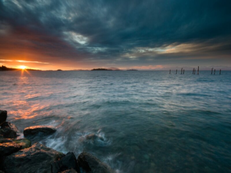 Sunset over Ocean — Blue, Dramatic, Photograph, Rocks