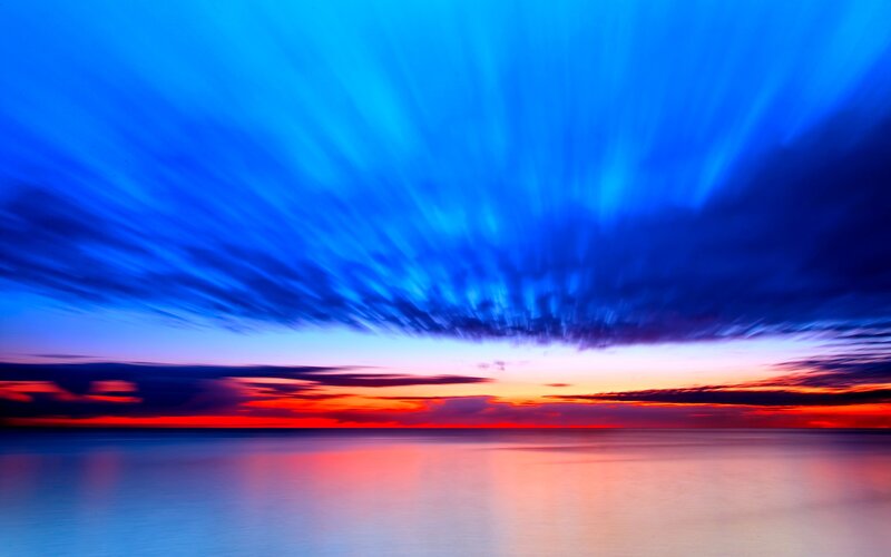 Sunset over Ocean — Blue, Dramatic, Photograph, Sky, Clouds