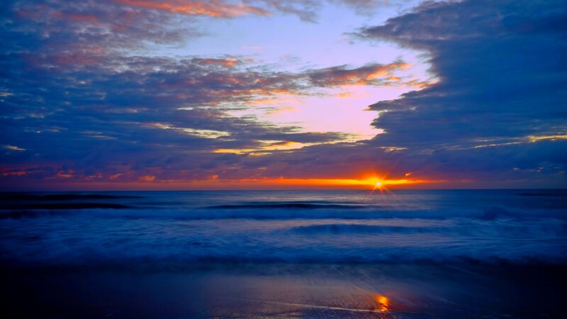 Sunset over Ocean — Blue, Dramatic, Photograph, Sun, Clouds, Waves, Orange, Purple