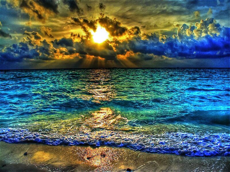 Sunset over Ocean — Blue, Dramatic, Photograph, Sun, Clouds, Waves, Sand