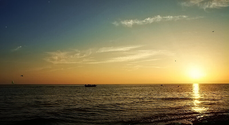 Sunset over Ocean — Blue, Serene, Photograph, Boat