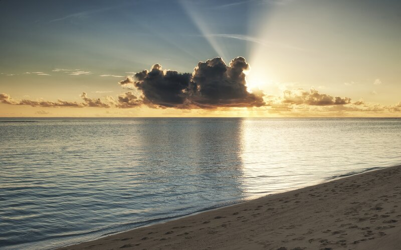 Sunset over Ocean — Blue, Serene, Photograph, Clouds, Sand