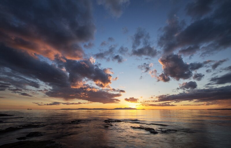 Sunset over Ocean — Blue, Serene, Photograph, Clouds, Sun, Water