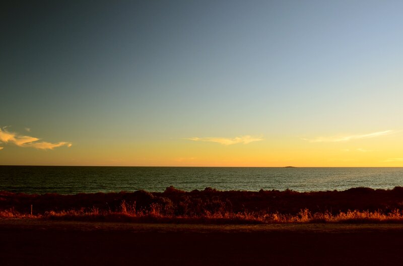 Sunset over Ocean — Blue, Serene, Photograph, Sky, Vegetation