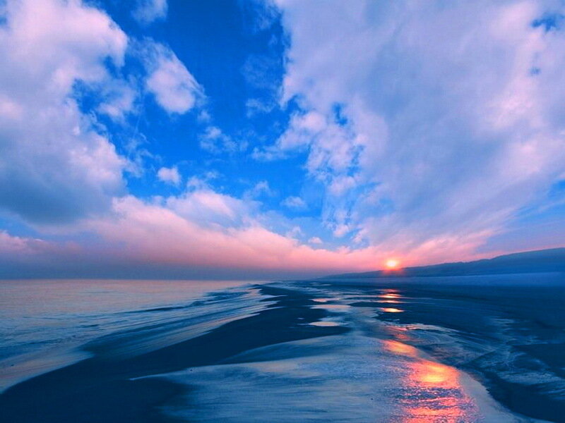 Sunset over Ocean — Blue, Serene, Photograph, Sun, Clouds