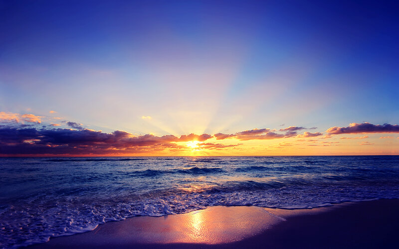 Sunset over Ocean — Blue, Serene, Photograph, Sun, Clouds, Waves