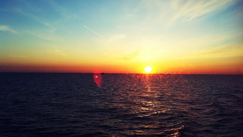 Sunset over Ocean — Blue, Serene, Photograph, Sun, Ship