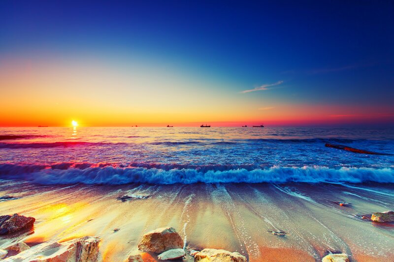 Sunset over Ocean — Blue, Serene, Photograph, Waves, Ships