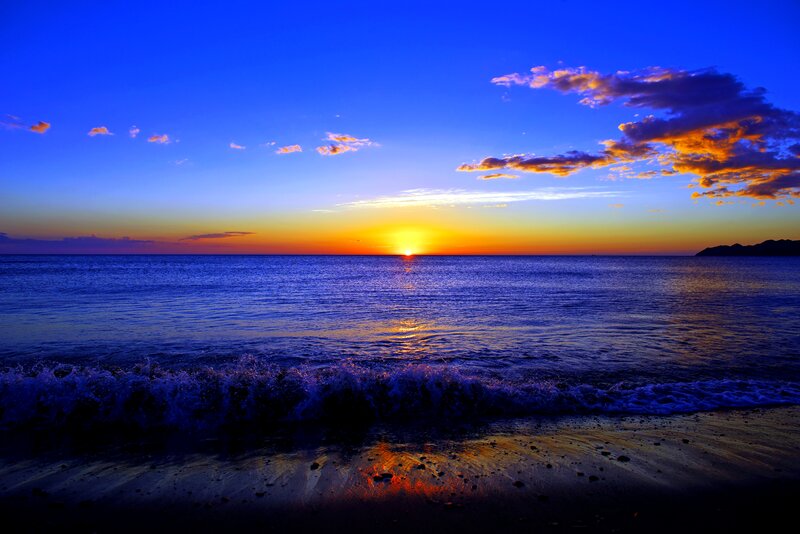 Sunset over Ocean — Blue, Serene, Photograph, Waves