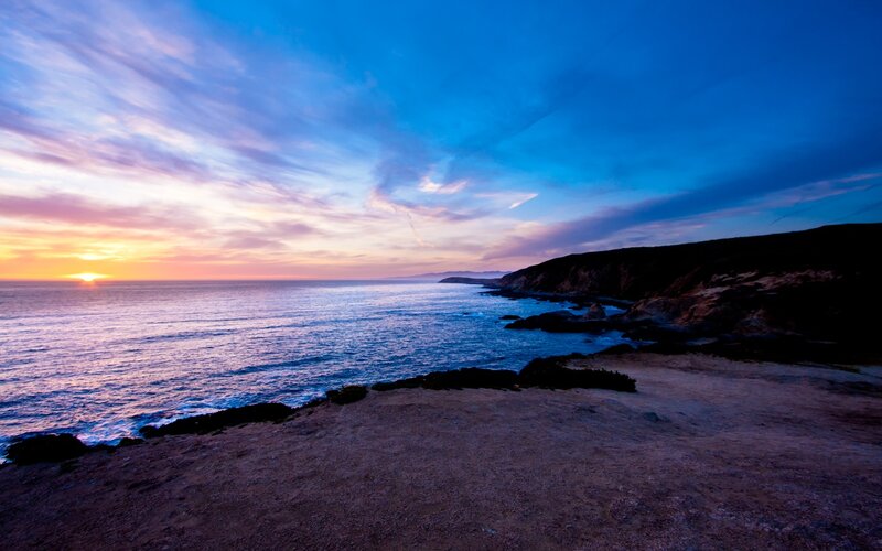 Sunset over Ocean Cliffs — Blue