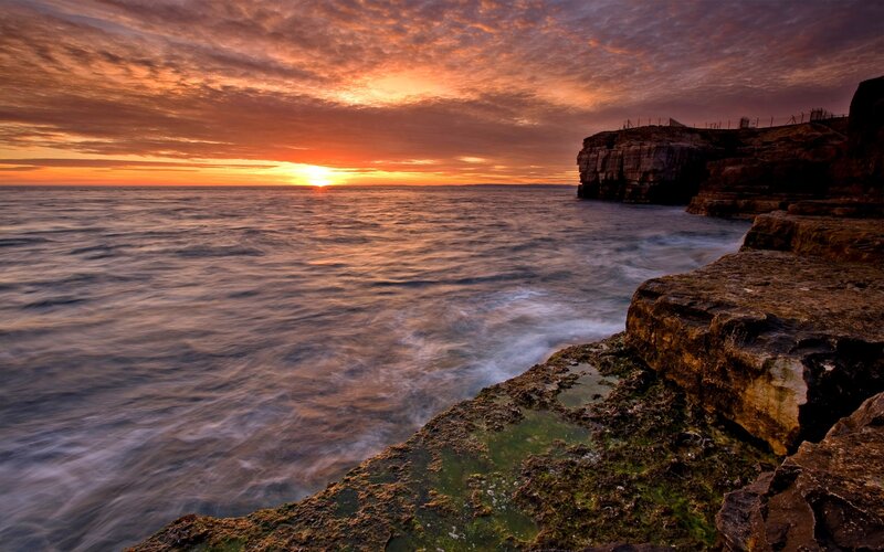 Sunset over Ocean Cliffs — Orange