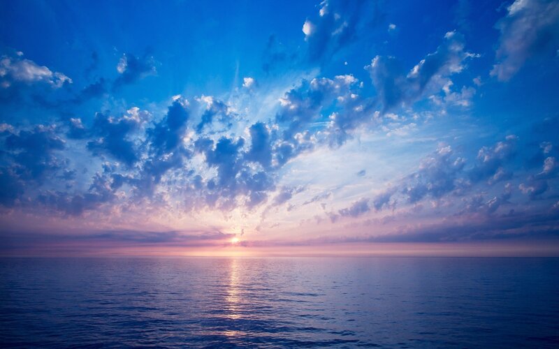 Sunset over Ocean — Clouds