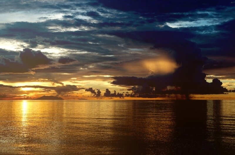 Sunset over Ocean — Gold, Dramatic, Photograph, Clouds, Mountain