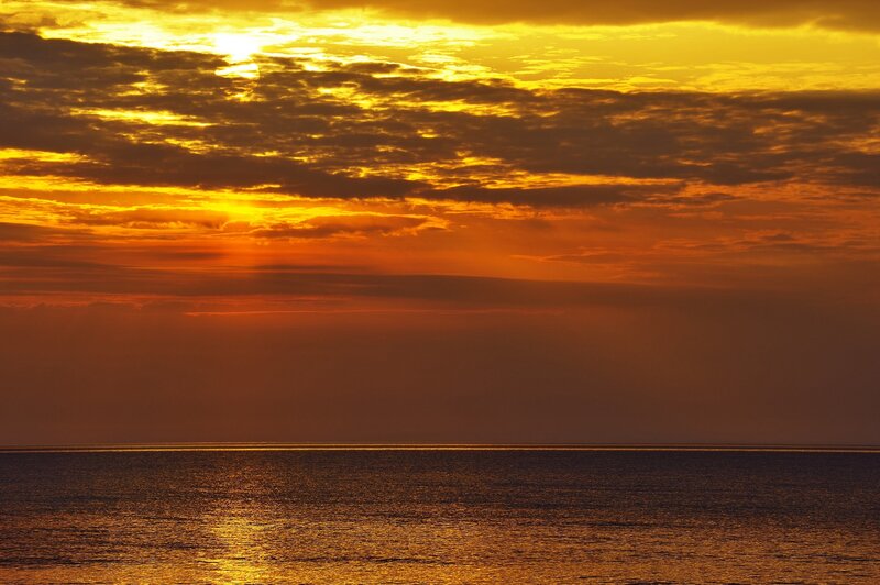 Sunset over Ocean — Gold, Dramatic, Photograph, Sun, Clouds, Sea