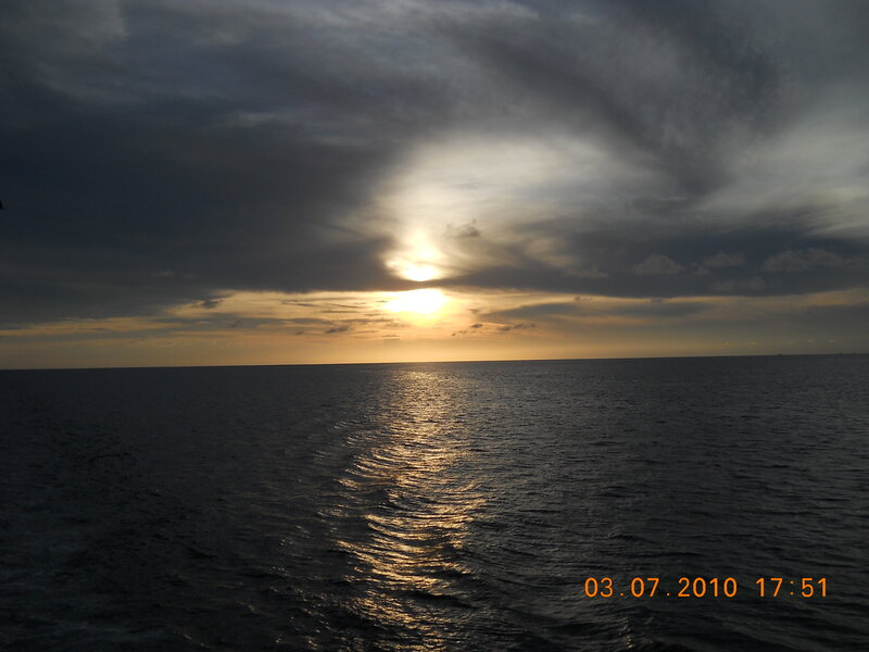 Sunset over Ocean — Gray, Dramatic, Photograph