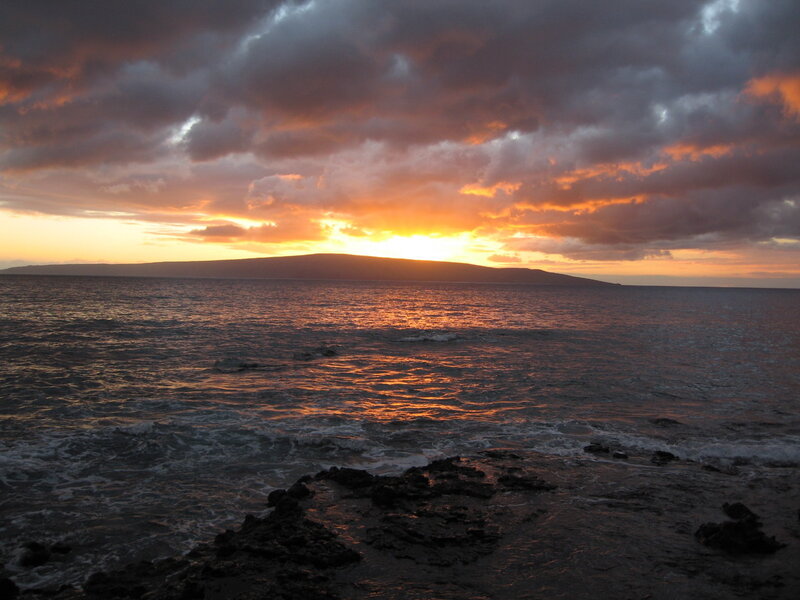 sunset over ocean island