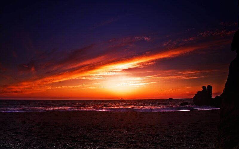 Sunset over Ocean — Orange, Dramatic, Photograph, Beach, Rocks