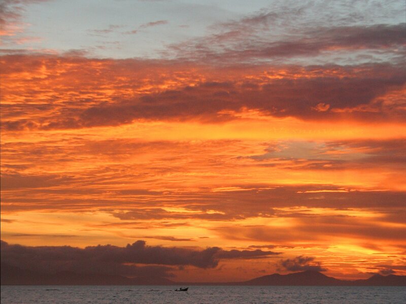 Sunset over Ocean — Orange, Dramatic, Photograph, Boat, Mountains