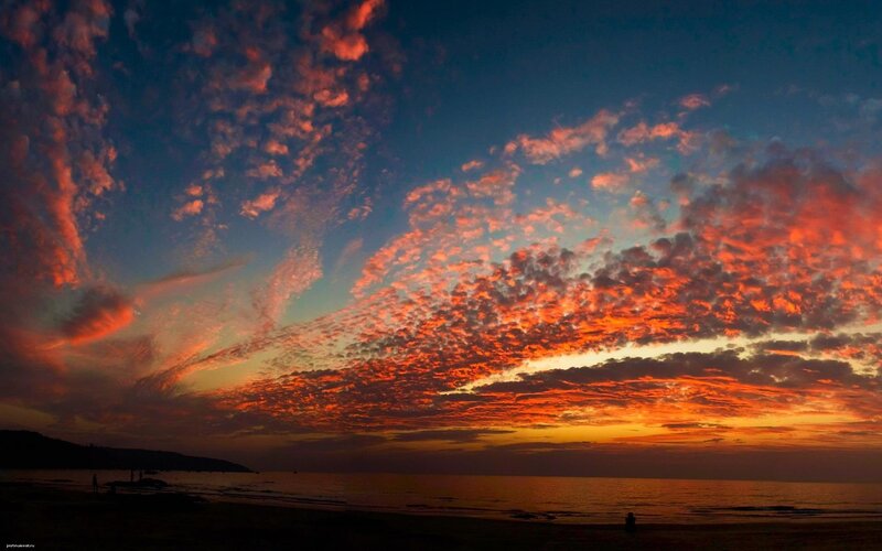 Sunset over Ocean — Orange, Dramatic, Photograph, Clouds, Beach, Silhouettes