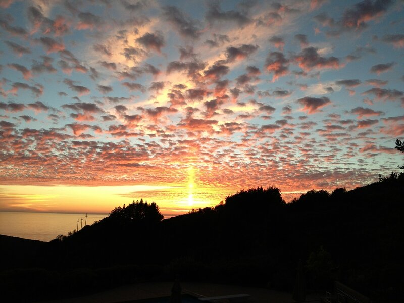 Sunset over Ocean — Orange, Dramatic, Photograph, Clouds, Hills