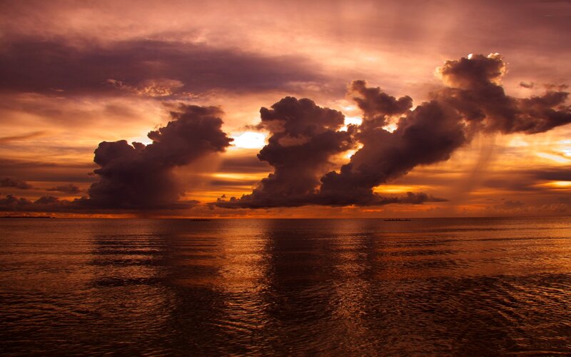 Sunset over Ocean — Orange, Dramatic, Photograph, Clouds, Sea, Boats