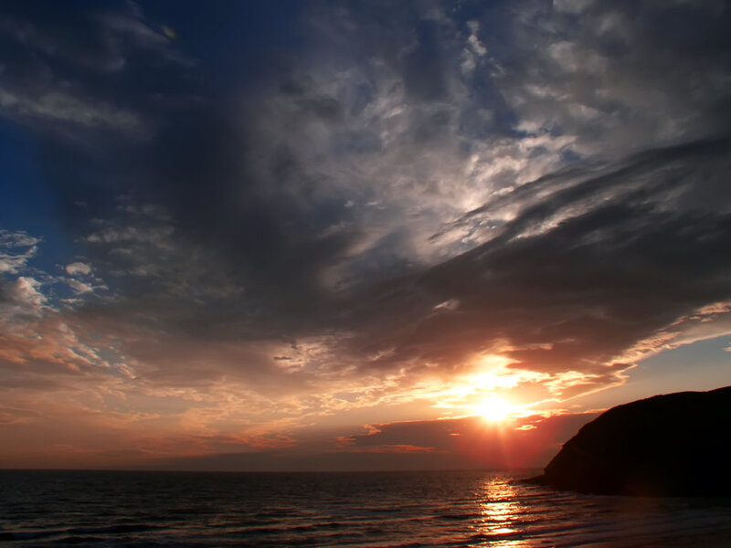 Sunset over Ocean — Orange, Dramatic, Photograph, Clouds, Sea, Cliff, Blue