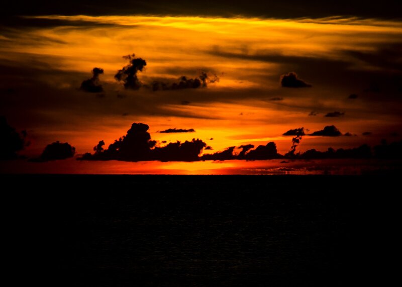 Sunset over Ocean — Orange, Dramatic, Photograph, Clouds, Sky, Sea, Black